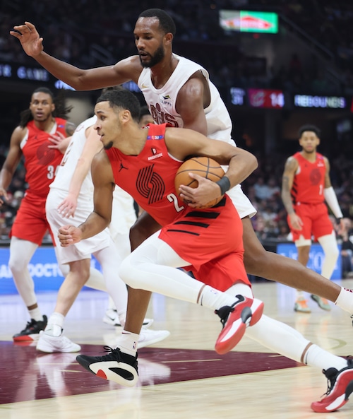 Cavs' 50th Win: Hunter's 32-Point Performance Fuels Overtime Triumph