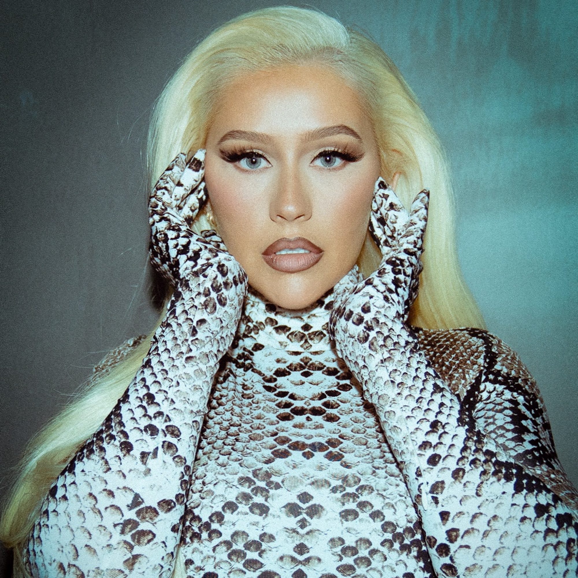 Christina Aguilera's Latest Photoshoot Sparks Debate Over Image Editing Christina Aguilera's Latest Photoshoot Sparks Debate Over Image Editing