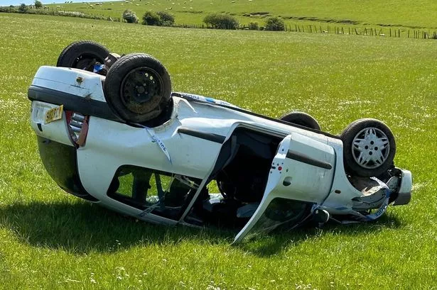 Emergency Services Respond To M56 Crash: Car Overturn And Casualty Emergency Services Respond To M56 Crash: Car Overturn And Casualty