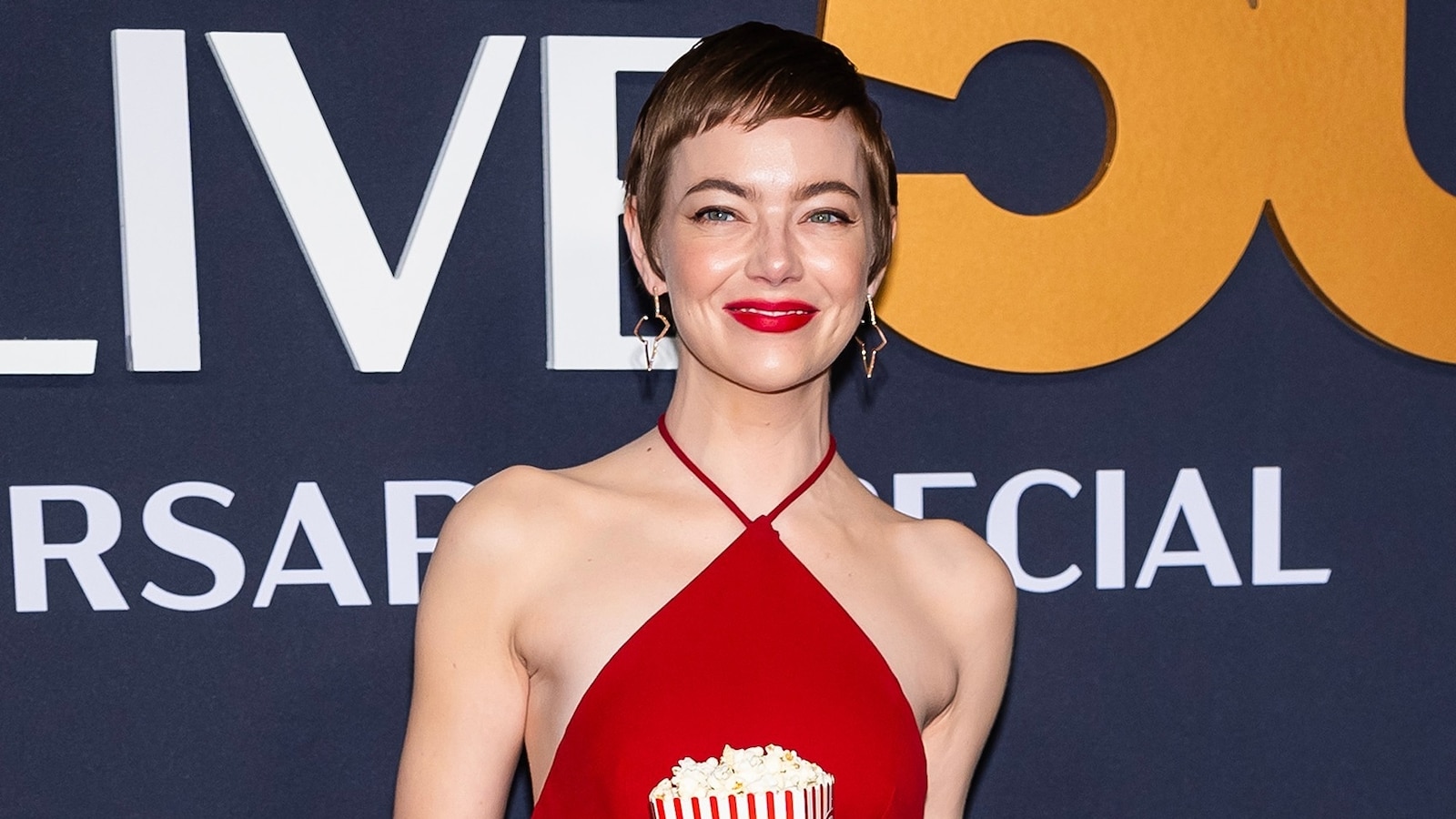 Internet Buzz Over Emma Stone's Unique SNL Dress: Is It A New Fashion Statement? Internet Buzz Over Emma Stone's Unique SNL Dress: Is It A New Fashion Statement?
