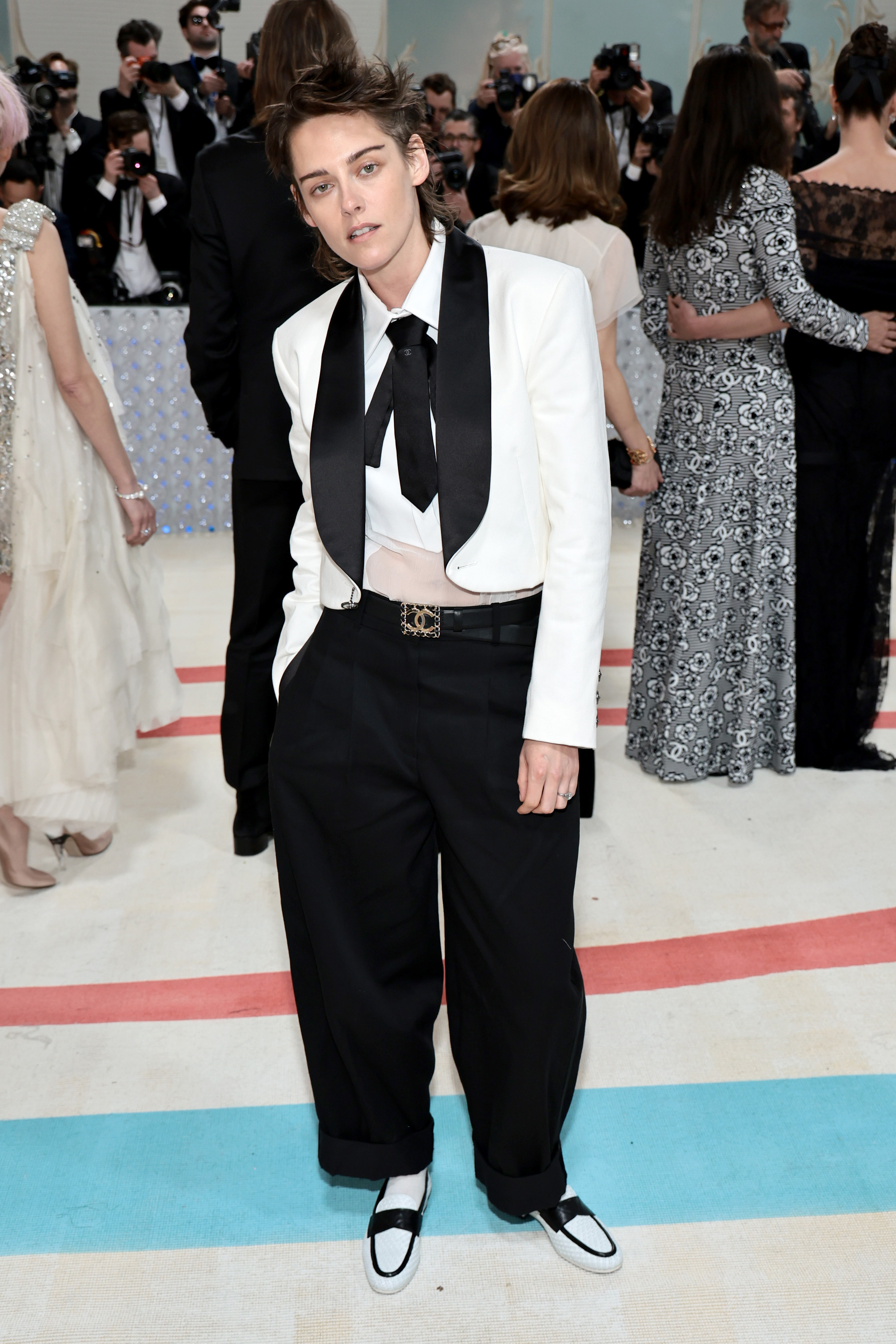 Kristen Stewart In White Satin: A Cannes 2025 Highlight Kristen Stewart In White Satin: A Cannes 2025 Highlight
