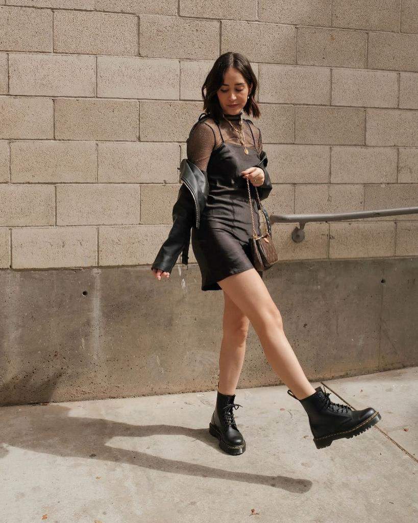 Selena Gomez's Latest Look: Leather Dress And Edgy Boots Selena Gomez's Latest Look: Leather Dress And Edgy Boots